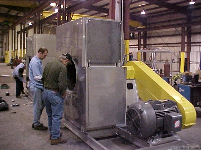 Custom Built Machinery and Enclosures - Image of workers inspecting custom industrial fan and enclosure