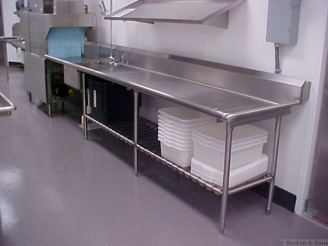 Custom Stainless Steel Commercial Kitchen Equipment - Image of a restaurant stainless steel dish washing station, table and dishwasher